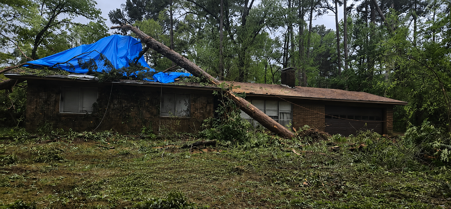 Storm-Struck Roof, Cleared In A Day — before